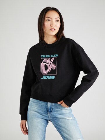 Sweat-shirt Calvin Klein Jeans en noir : devant