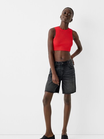 Top in maglia di Bershka in rosso