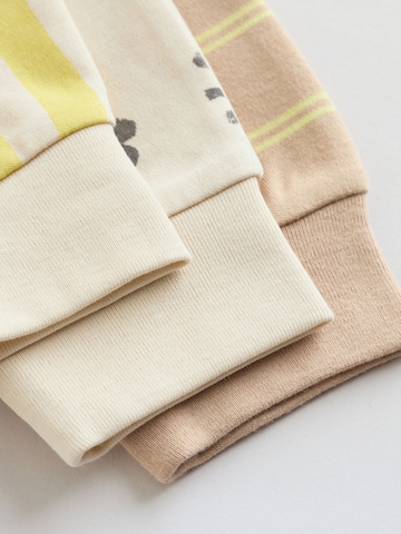 Next Комплект пижама в бежово