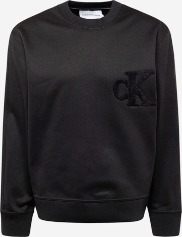 Sweat-shirt Calvin Klein Jeans en noir : devant