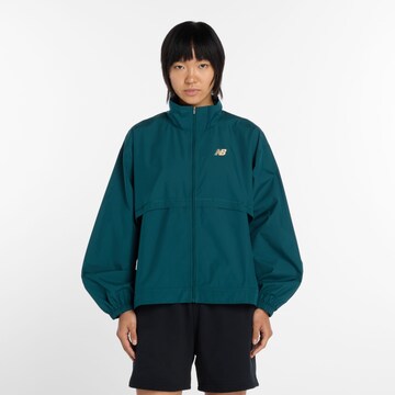 Veste de sport 'Trackside Woven Jacket' new balance en vert : devant