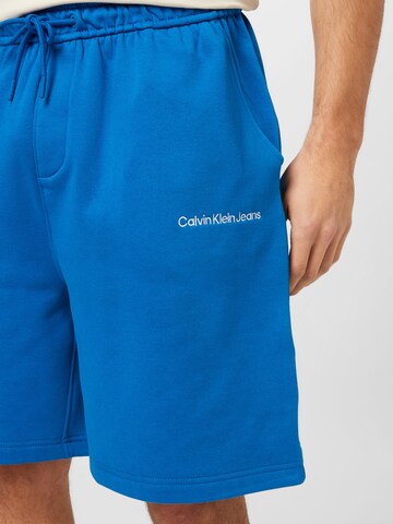 mėlyna Calvin Klein Jeans Laisvas Kelnės