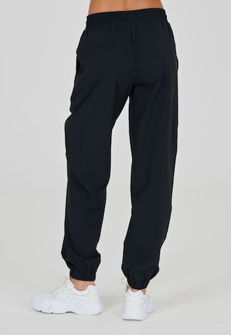 Athlecia Regular Workout Pants 'Hero' in Black