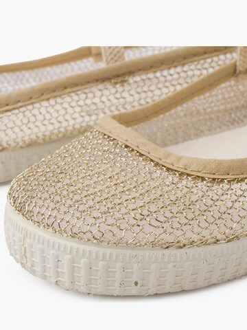 Ballerina di Pisamonas in oro