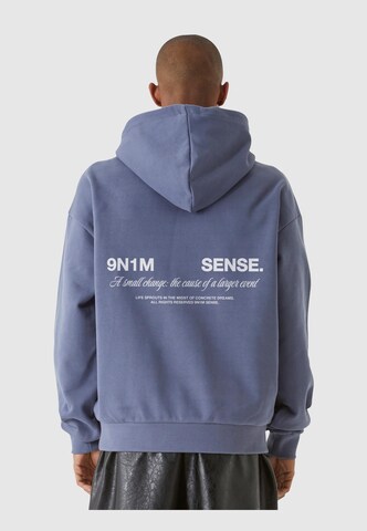 9N1M SENSE Sweatshirt 'Change' in Blauw: voorkant