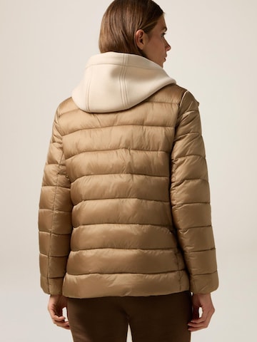 Giacca invernale di oltre in beige