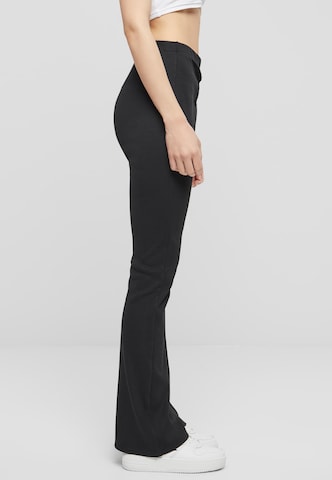 évasé Pantalon Karl Kani en noir