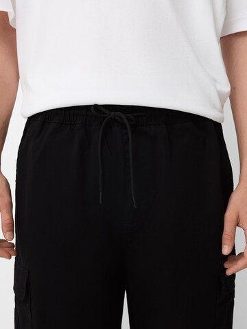 Bershka Loosefit Gargohousut värissä musta