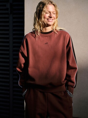 Sweat-shirt self. en marron