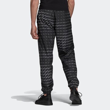 Effilé Pantalon ADIDAS ORIGINALS en noir