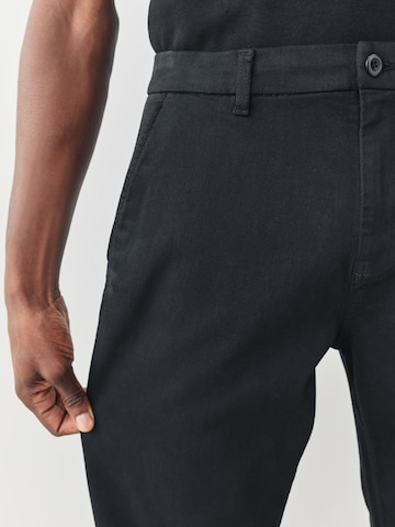 Next Regular Chinohousut värissä musta