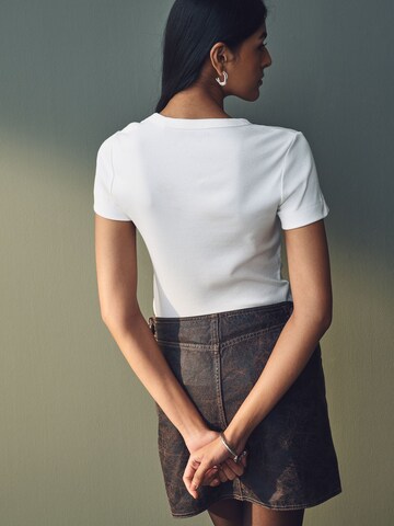 zaļš Next Bodijs-krekls