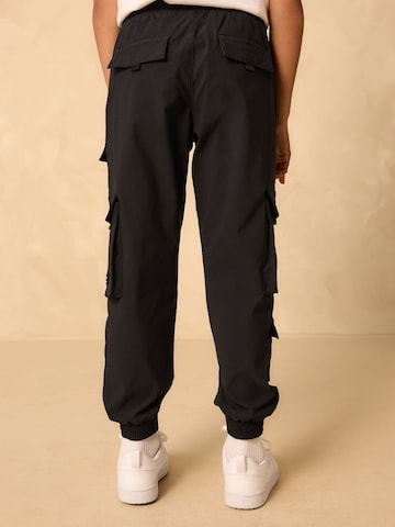 Tapered Pantaloni de la Next pe negru
