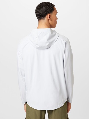 UNDER ARMOURSportska jakna 'Unstoppable' - bijela boja
