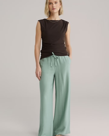 žalia WE Fashion Plačios klešnės Kelnės