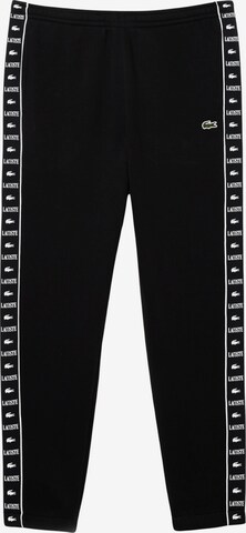 Effilé Pantalon de sport LACOSTE en noir : devant