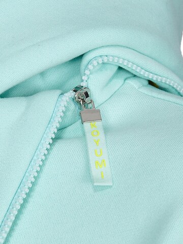 Koyumi Sweatshirt 'Free your Neck' in Groen