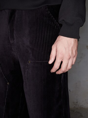 ABOUT YOU x Rewinside Regular Trousers 'Felix' in Black