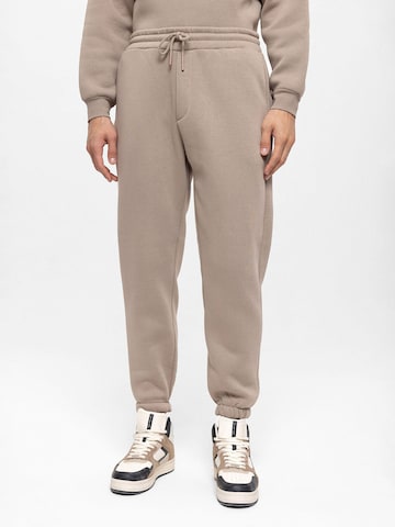 Antioch Tapered Trousers in Grey: front