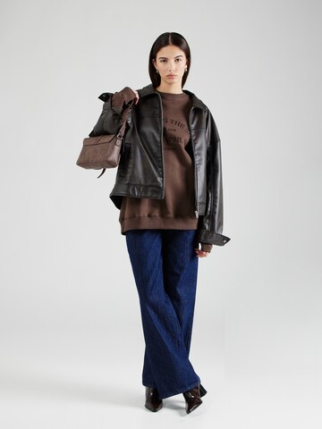 OH APRIL Sweatshirt 'Chasing' in Brown