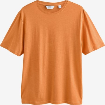 Next T-Shirt in Orange: Vorderseite