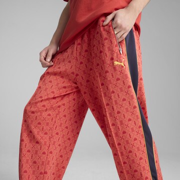 Loosefit Pantalon de sport 'Road To Unity' PUMA en rouge