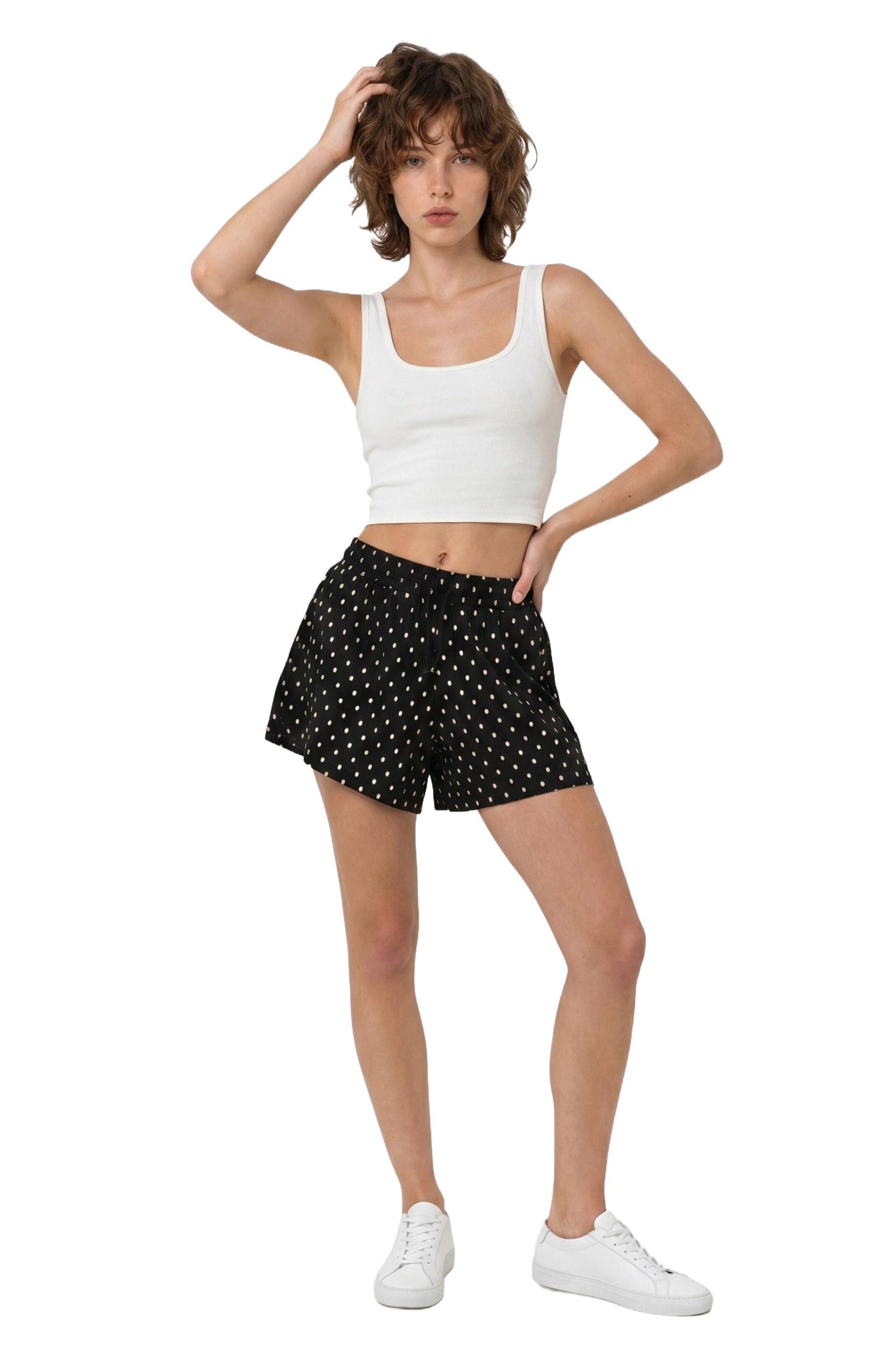 Alexa Dash Regular Trousers in Black: front