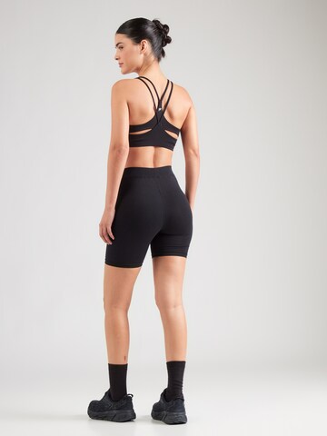 ELLESSE - Skinny Leggings 'Tour 2' em preto: atrás