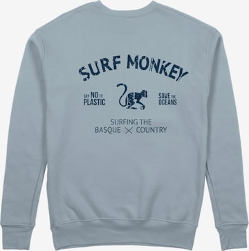 Sweat-shirt 'Rette das Ozean' Surf Monkey en bleu : devant