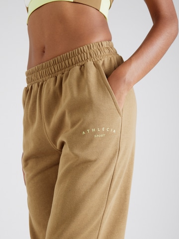 Athlecia Tapered Workout Pants 'Asport' in Brown