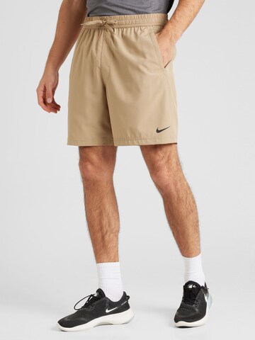 Regular Pantalon de sport 'Form' NIKE en vert : devant