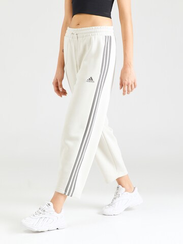 ADIDAS SPORTSWEAR Lużny krój Spodnie sportowe 'Essentials' w kolorze beżowy: przód