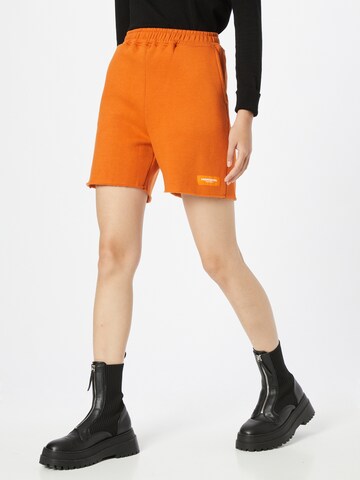 Public Desire Regular Pants in Orange: front