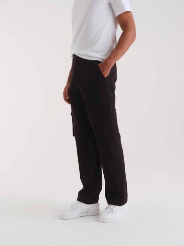 ABOUT YOU x Kevin Trapp Loose fit Cargo trousers 'Jaron' in Black