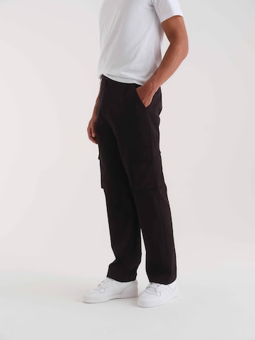 ABOUT YOU x Kevin Trapp - Loosefit Pantalón cargo 'Jaron' en negro