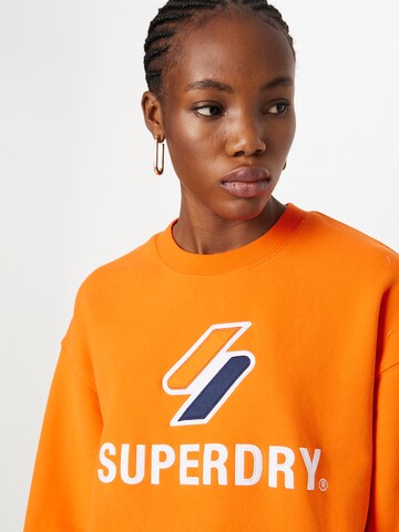 Bluză de molton de la Superdry pe portocaliu