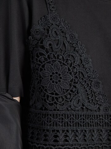 ONLY - Camiseta 'ONLBETSY' en negro