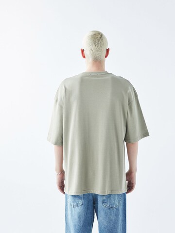 VAMOS CLO Bluser & t-shirts 'Hurst' i grøn
