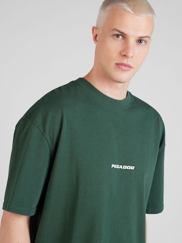 Pegador - Camisa em verde