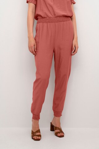 Cream Loose fit Pants in Red