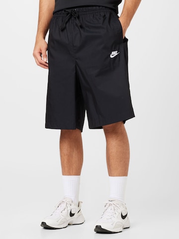 Nike Sportswear Loose fit Pants in Black: front