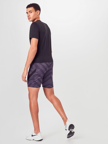 Regular Pantaloni sport de la NIKE pe mov