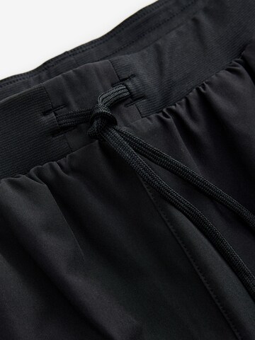 Next - Skinny Pantalón deportivo en negro