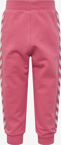 Completo sportivo di Hummel in rosa