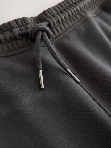 Next Tapered Hose in Grau