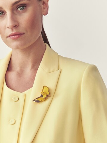 TATUUM - Broche 'IREKO' en amarillo: frente