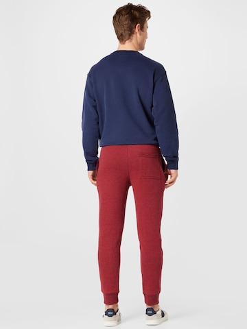 Effilé Pantalon Superdry en rouge