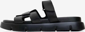 CESARE GASPARI Mules in Black: front