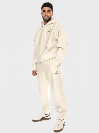 Carhartt WIP Spodnie 'American Script Jogging Pant Moonbeam' w rozmiarze 52 w kolorze beżowym, Podgląd produktu