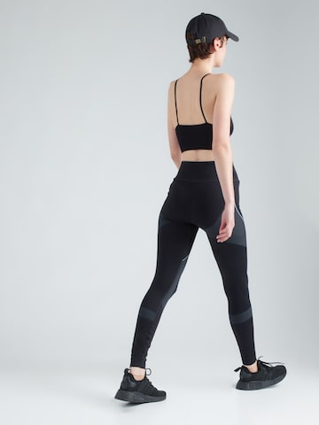 UNDER ARMOUR Skinny Sportbroek 'Vanish' in Zwart